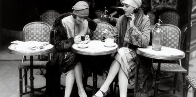 women-sitting-at-a-cafe-terrace
